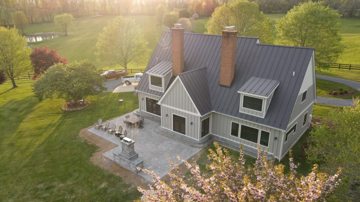 Custom deck with built-in planters, wood textures, and natural stone accents in Loudoun County