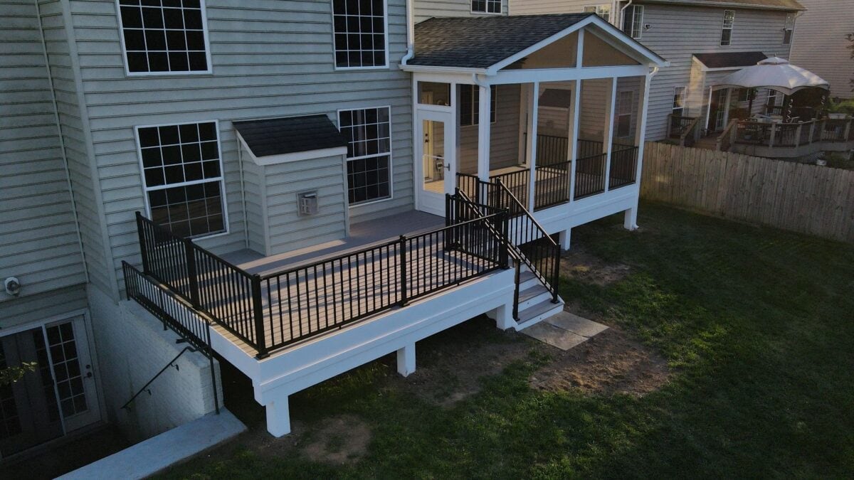 Elevated backyard deck with screened porch