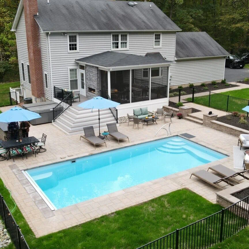 Pool surround and screened porch - a real project built by Battlefield Decks & Patios
